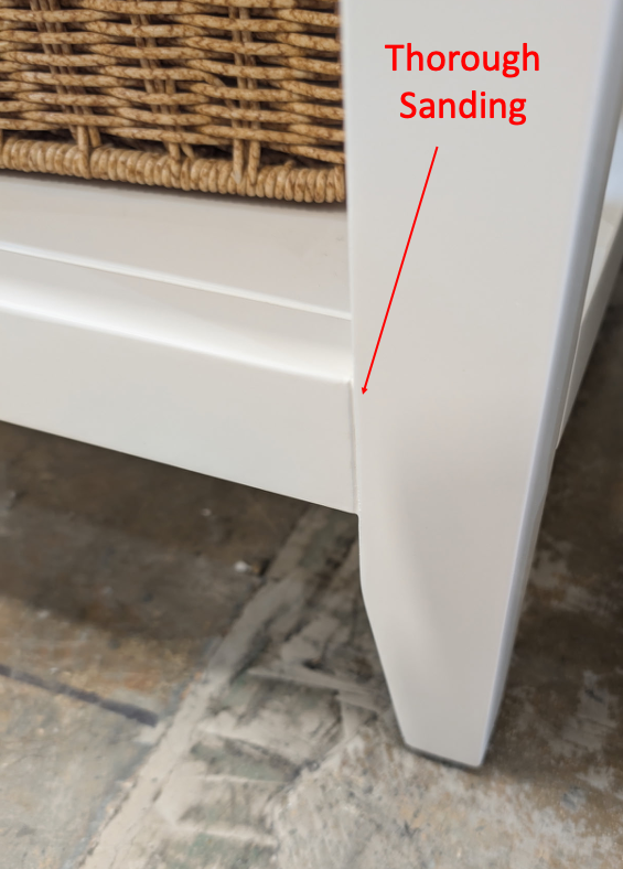 White bathroom vanity leg with thorough sanding and a clean, smooth painted edge